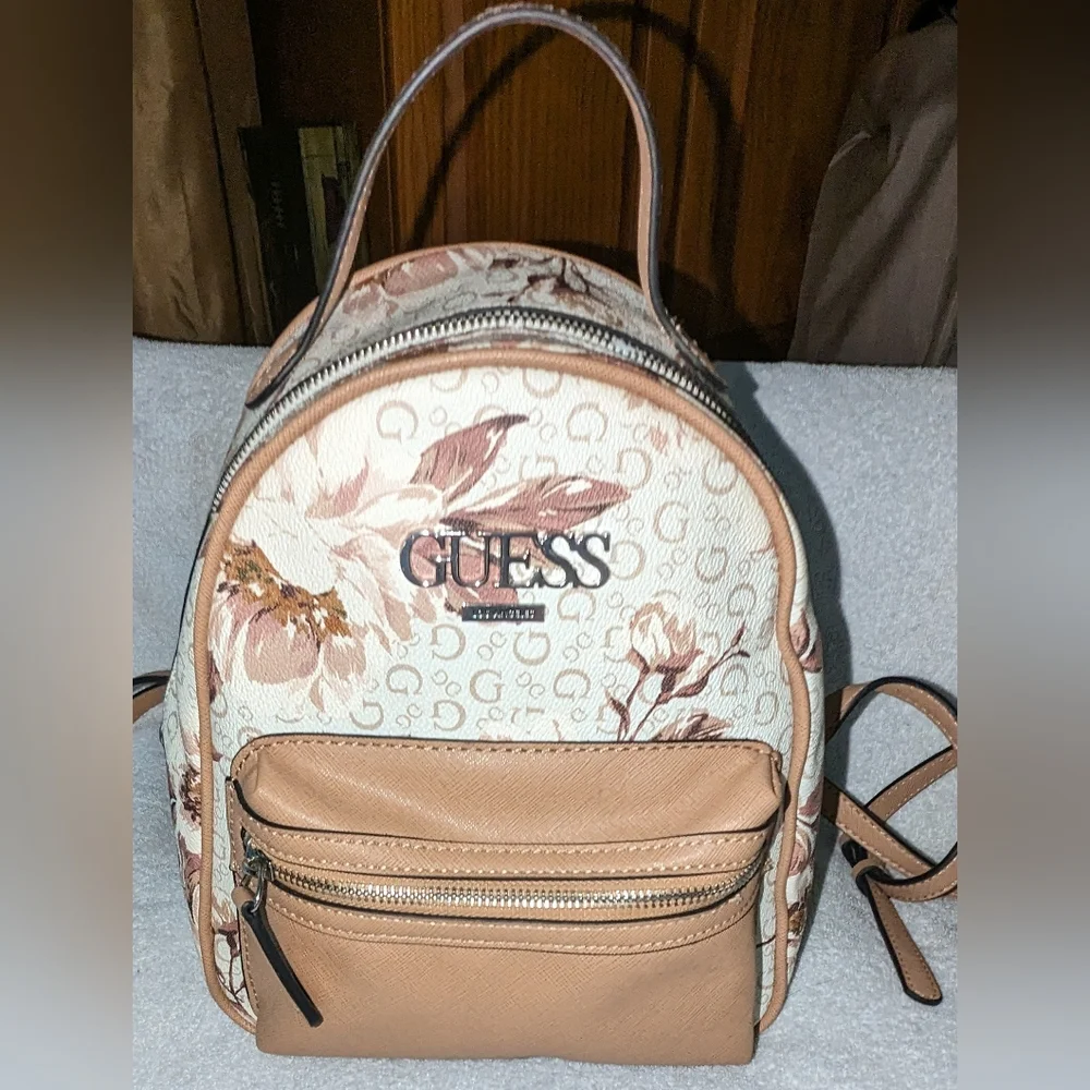 Guess women's floral logo small backpack.